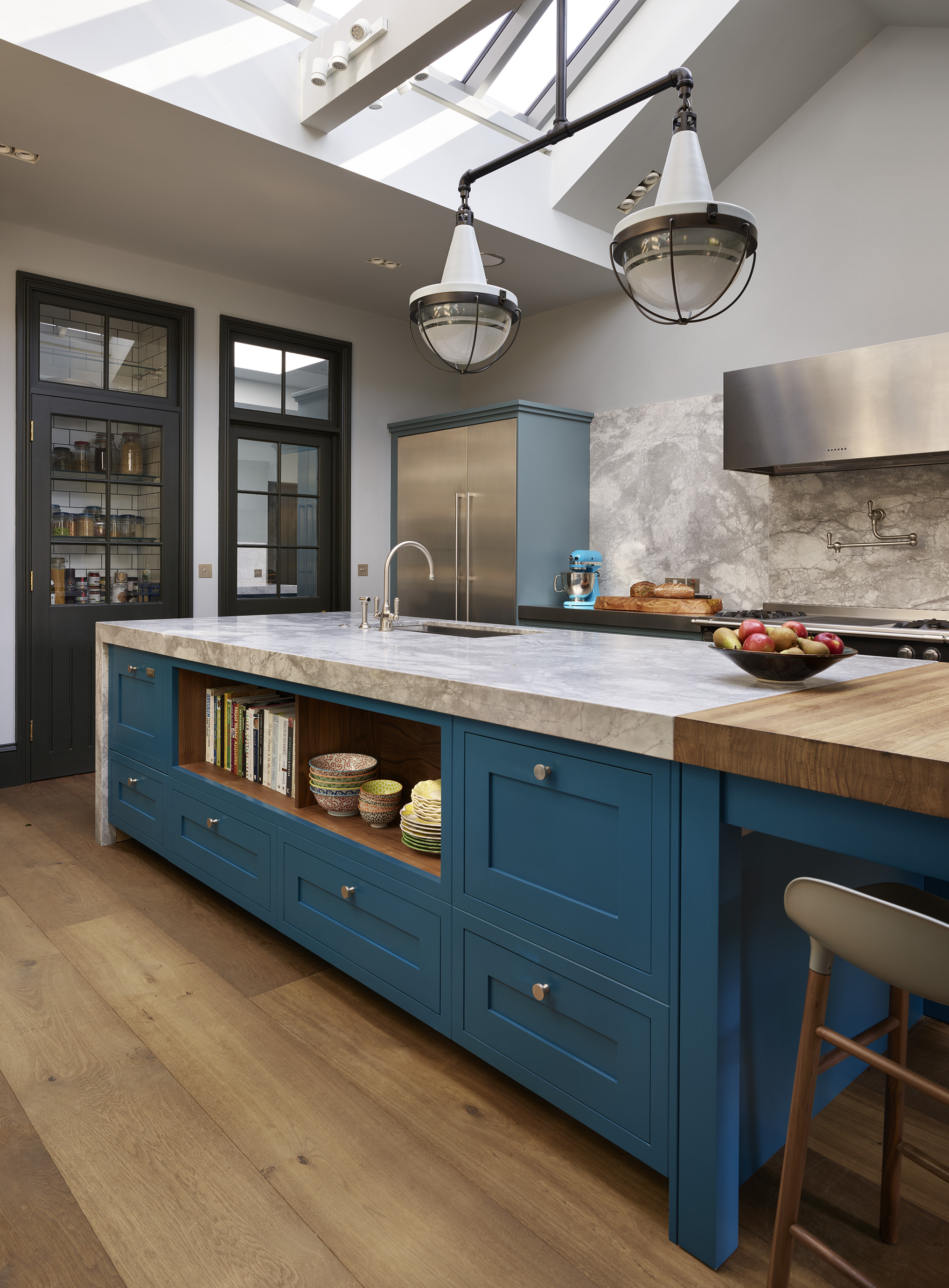 kitchen islands by roundhouse with wood and marble work surfaces and bespoke kitchen cupboards