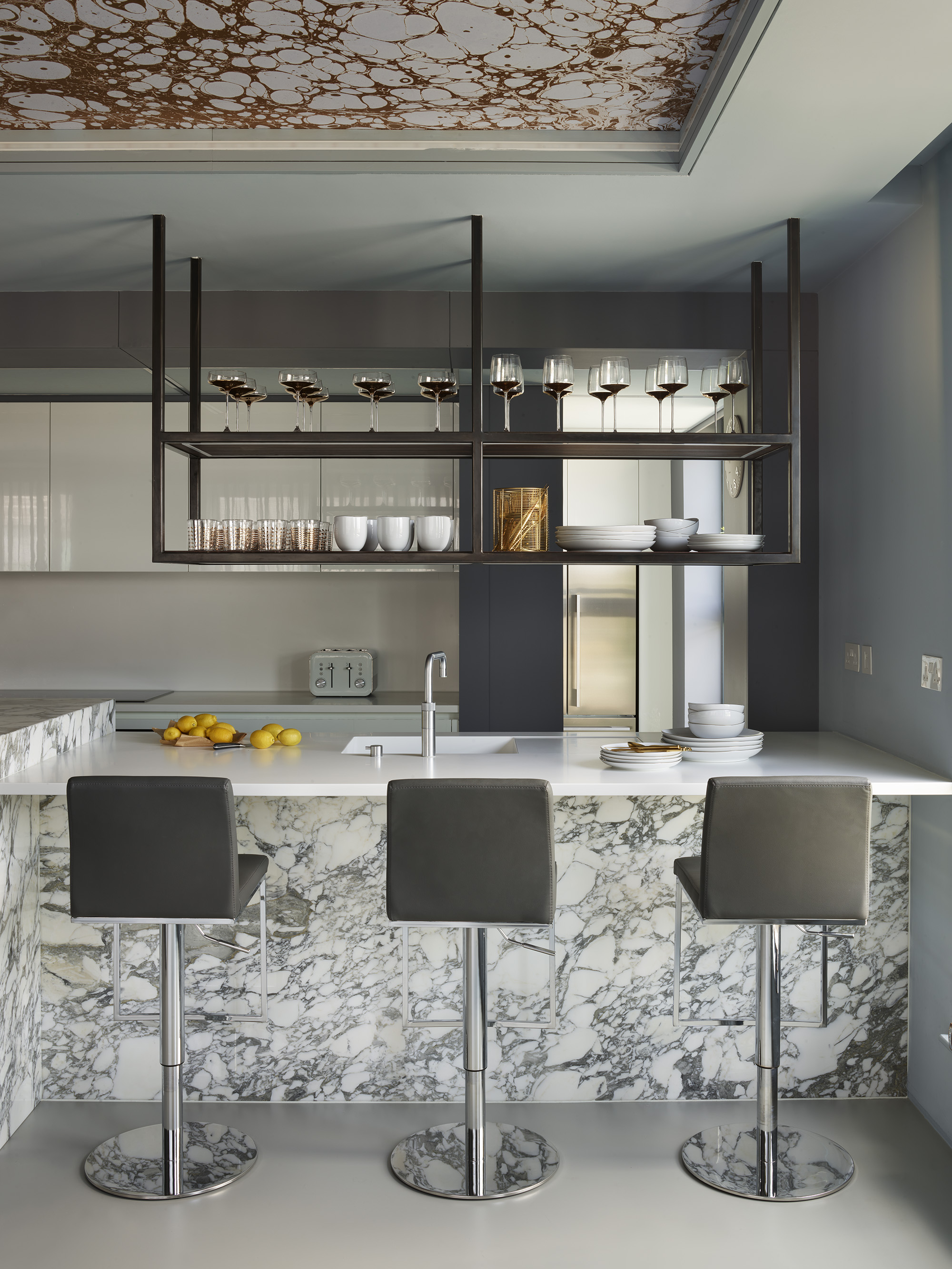 DC3980-014 modern kitchen islands by roundhouse with marble work surface and breakfast bar