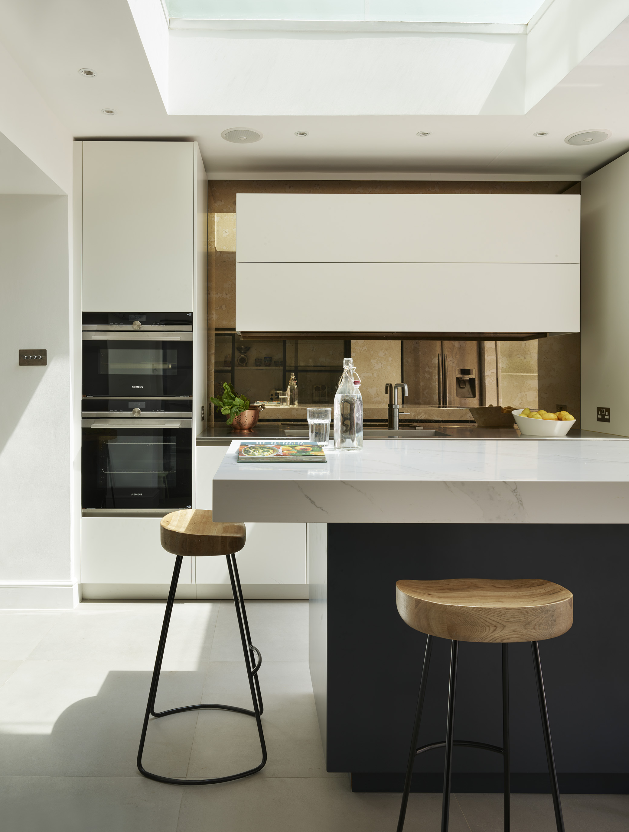 roundhouse luxury kitchens with kitchen island and marble work surface