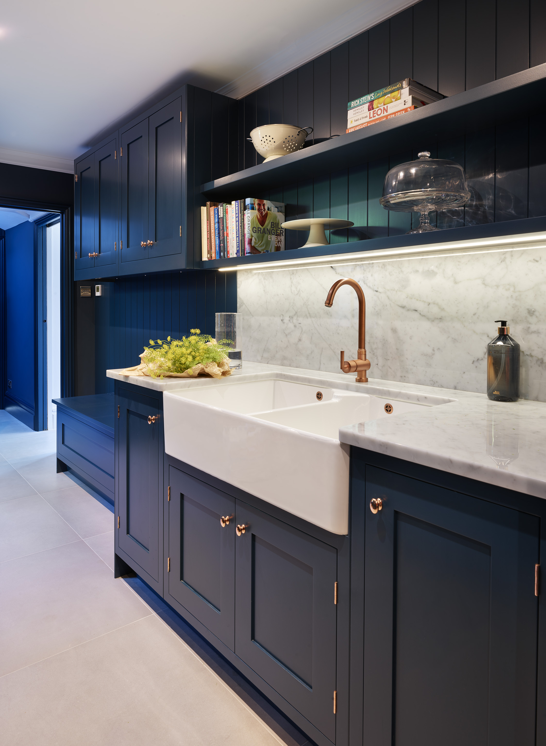 Stunning luxury kitchen in blue with butcher's sink