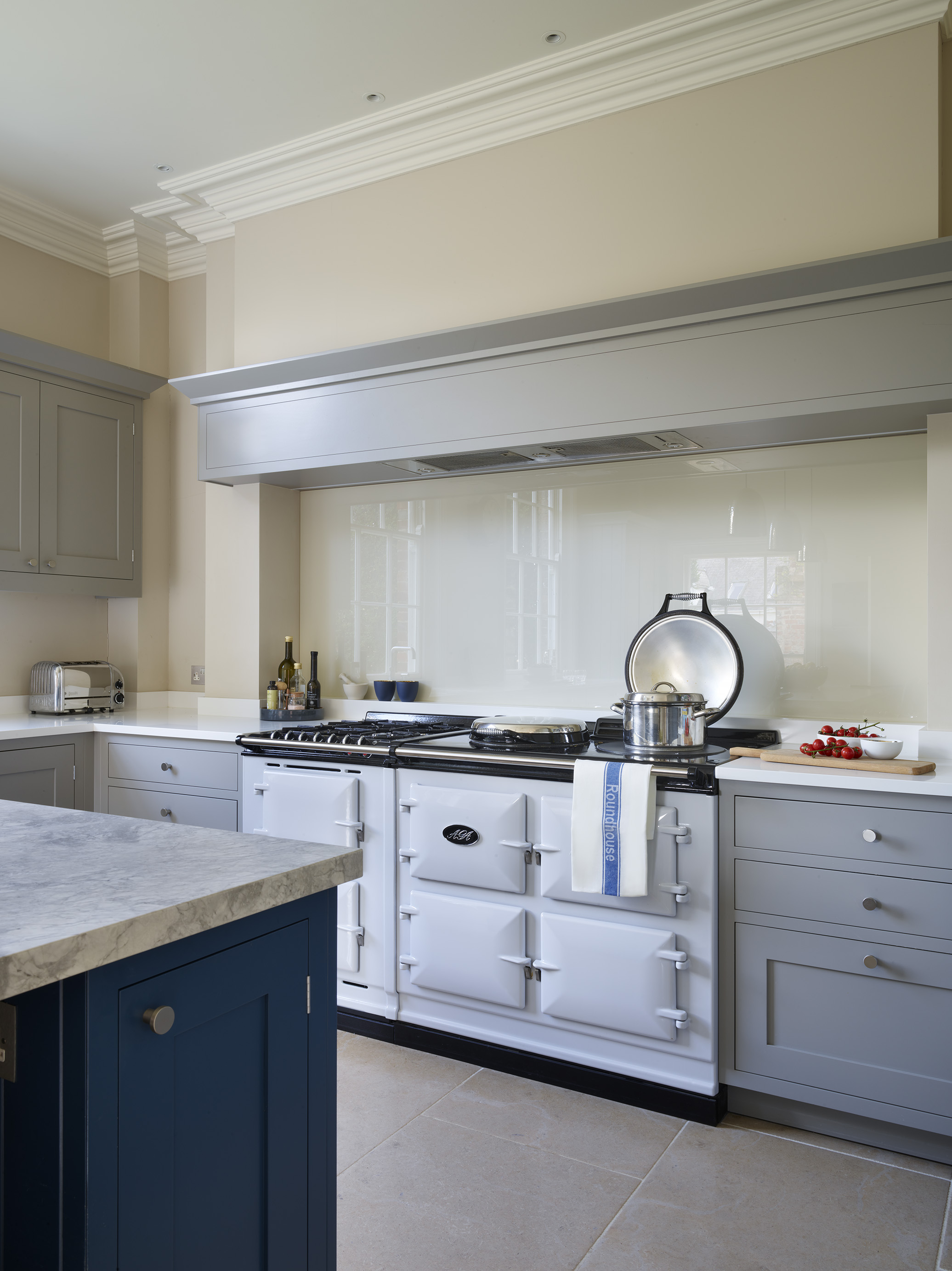 Modern kitchen ideas by Roundhouse with luxury kitchen appliances and marble work surface