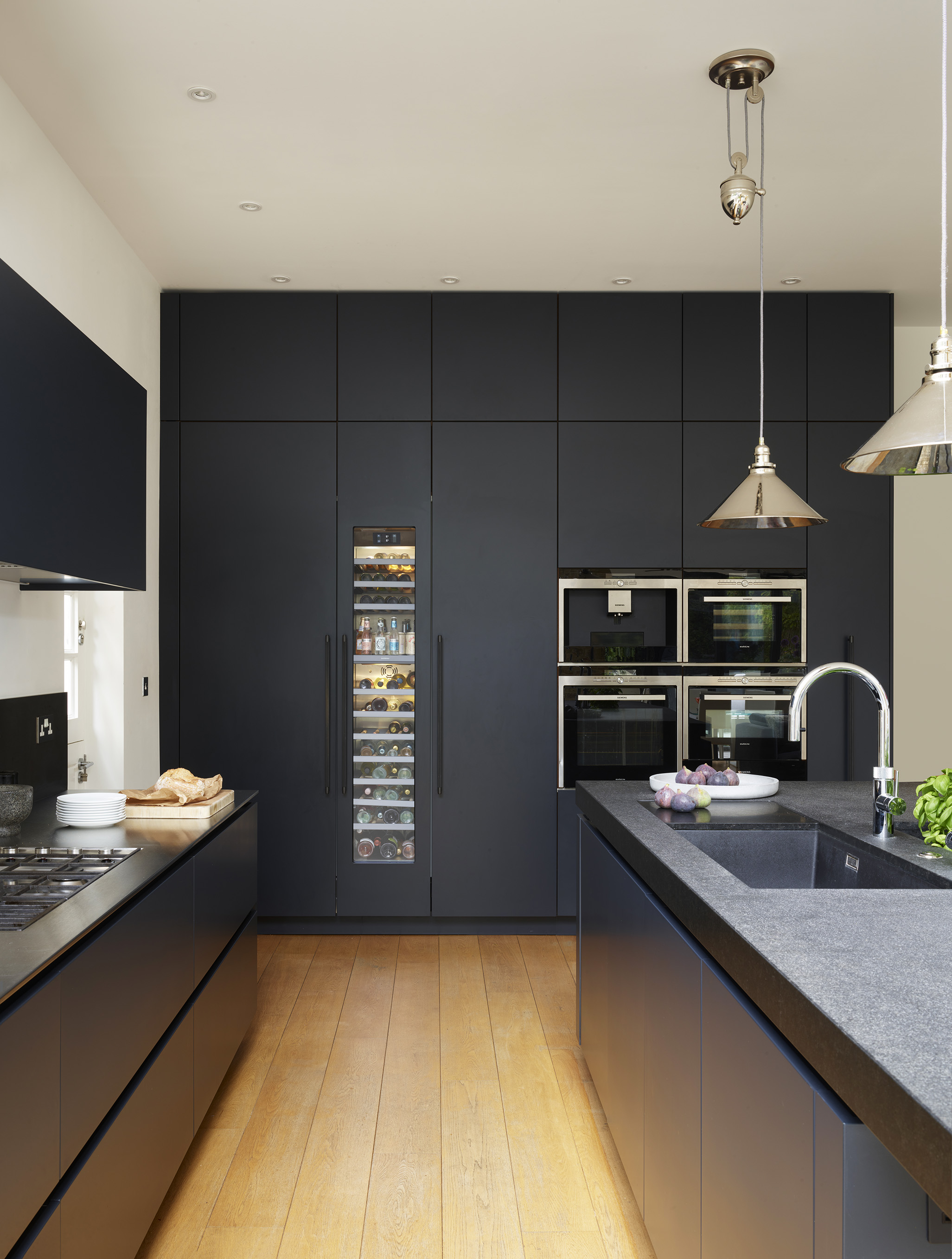 Modern kitchen ideas by Roundhouse with kitchen cupboards in grey