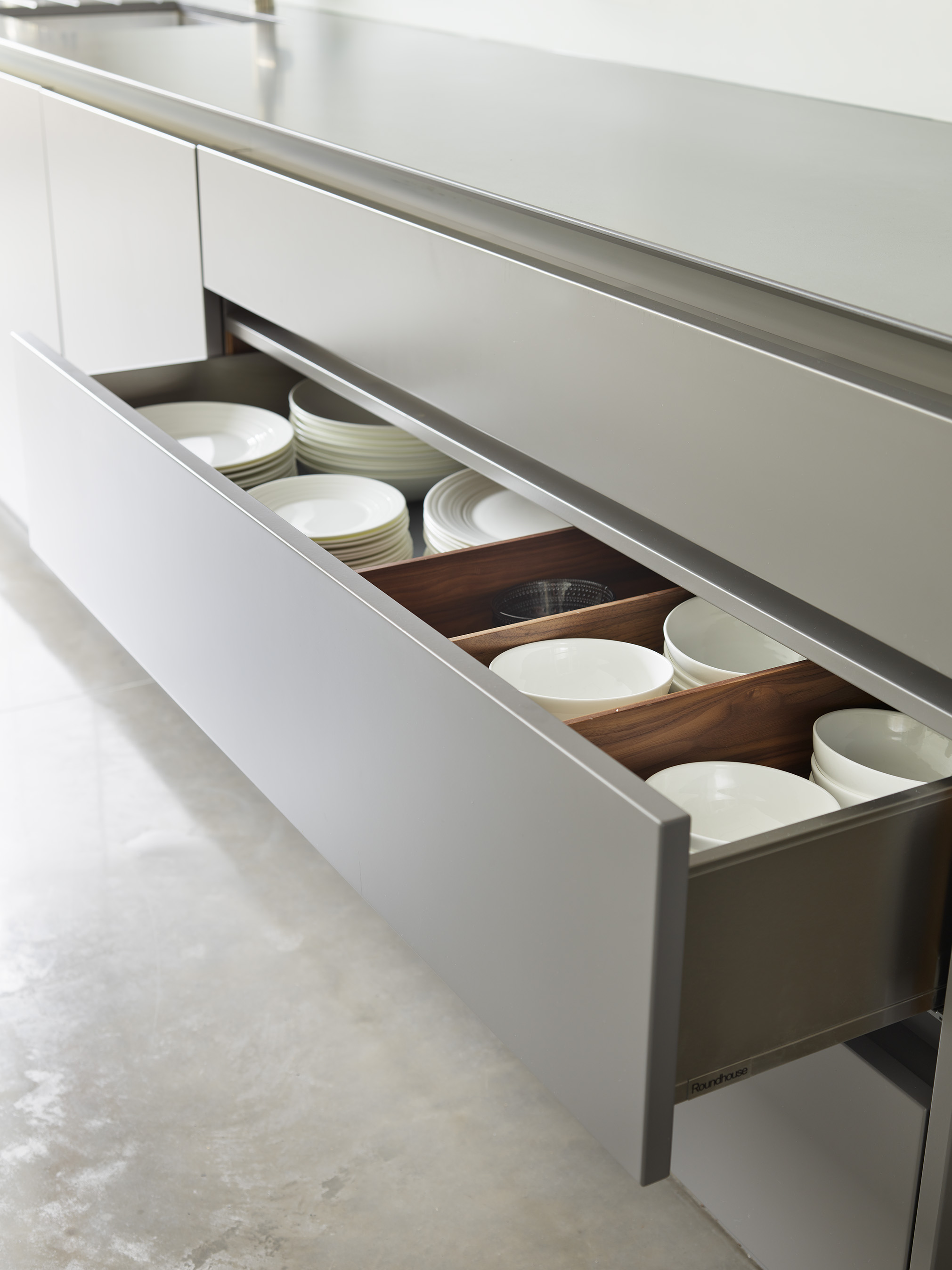 DC4162-030 Designs for modern kitchens by roundhouse with kitchen island and marble work surface