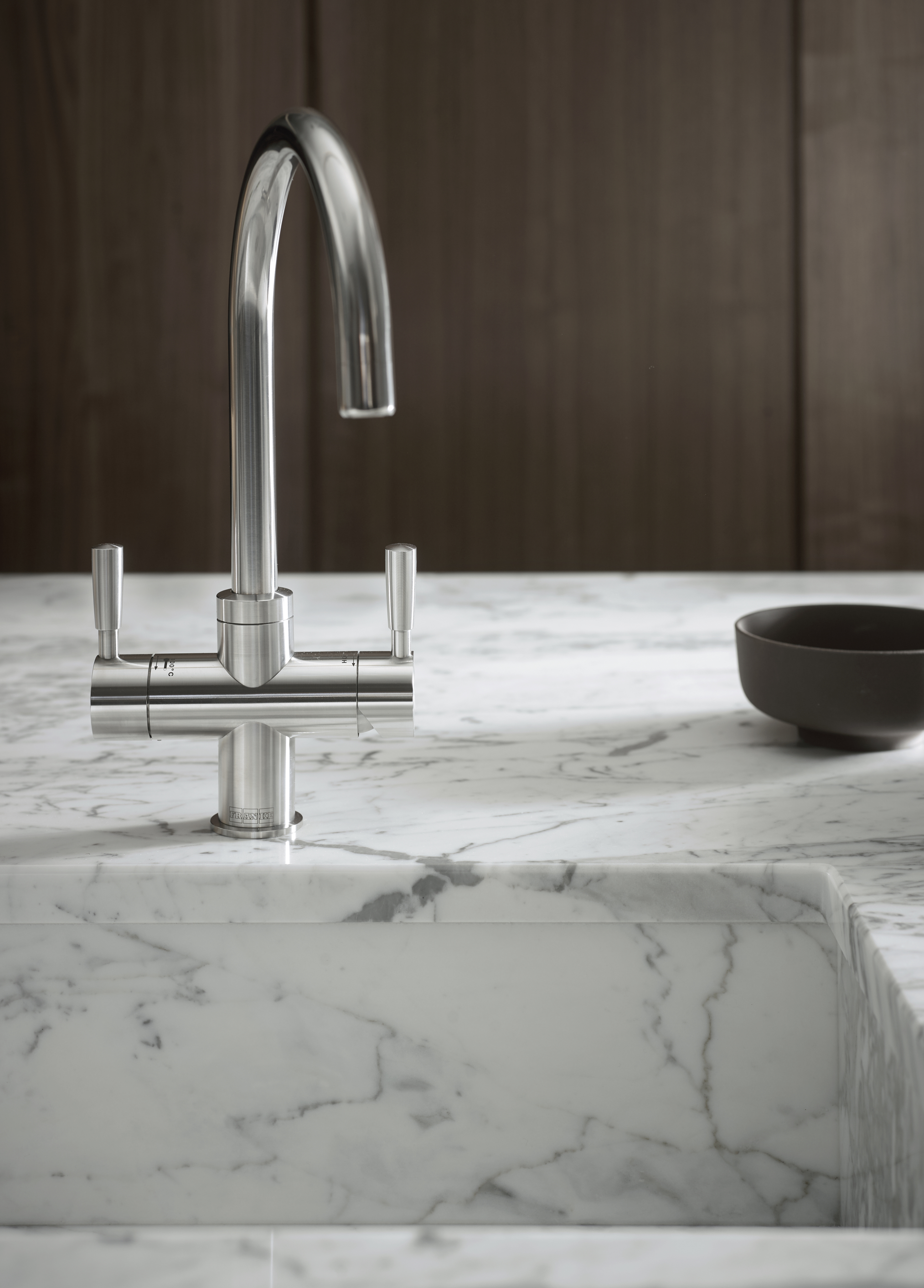 bespoke kitchen cabinets with luxury kitchen sink and marble work surface