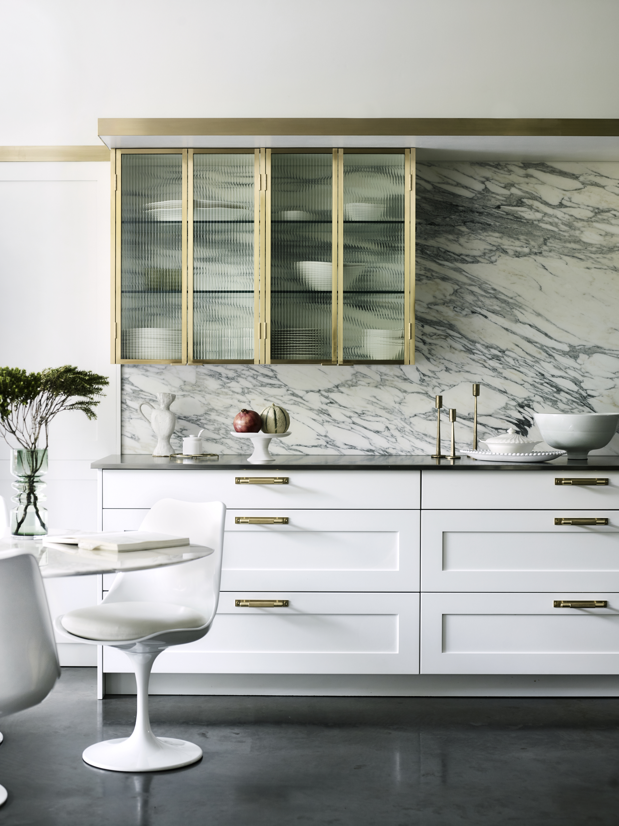 KITCHEN_DINING_ Contemporary kitchen cupboard handles in brass in a white kitchen