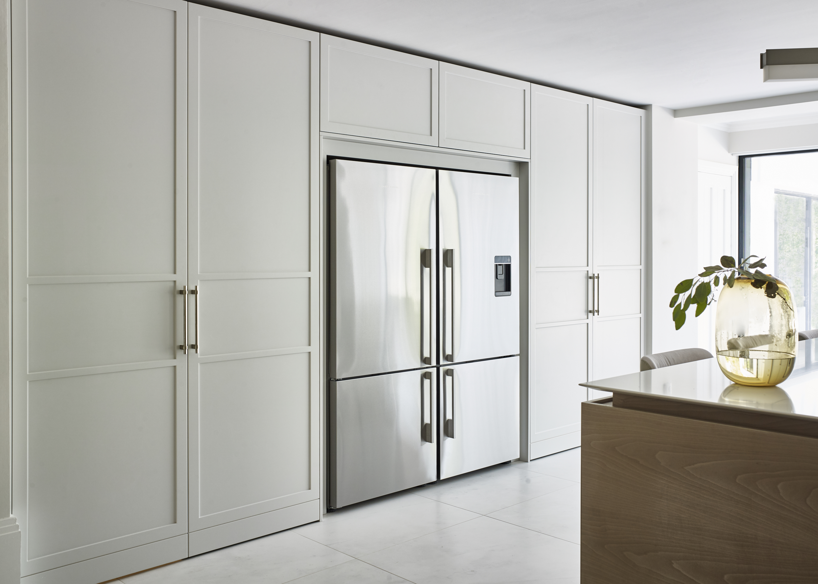 Luxury kitchen appliances with kitchen cupboards and bespoke kitchen island