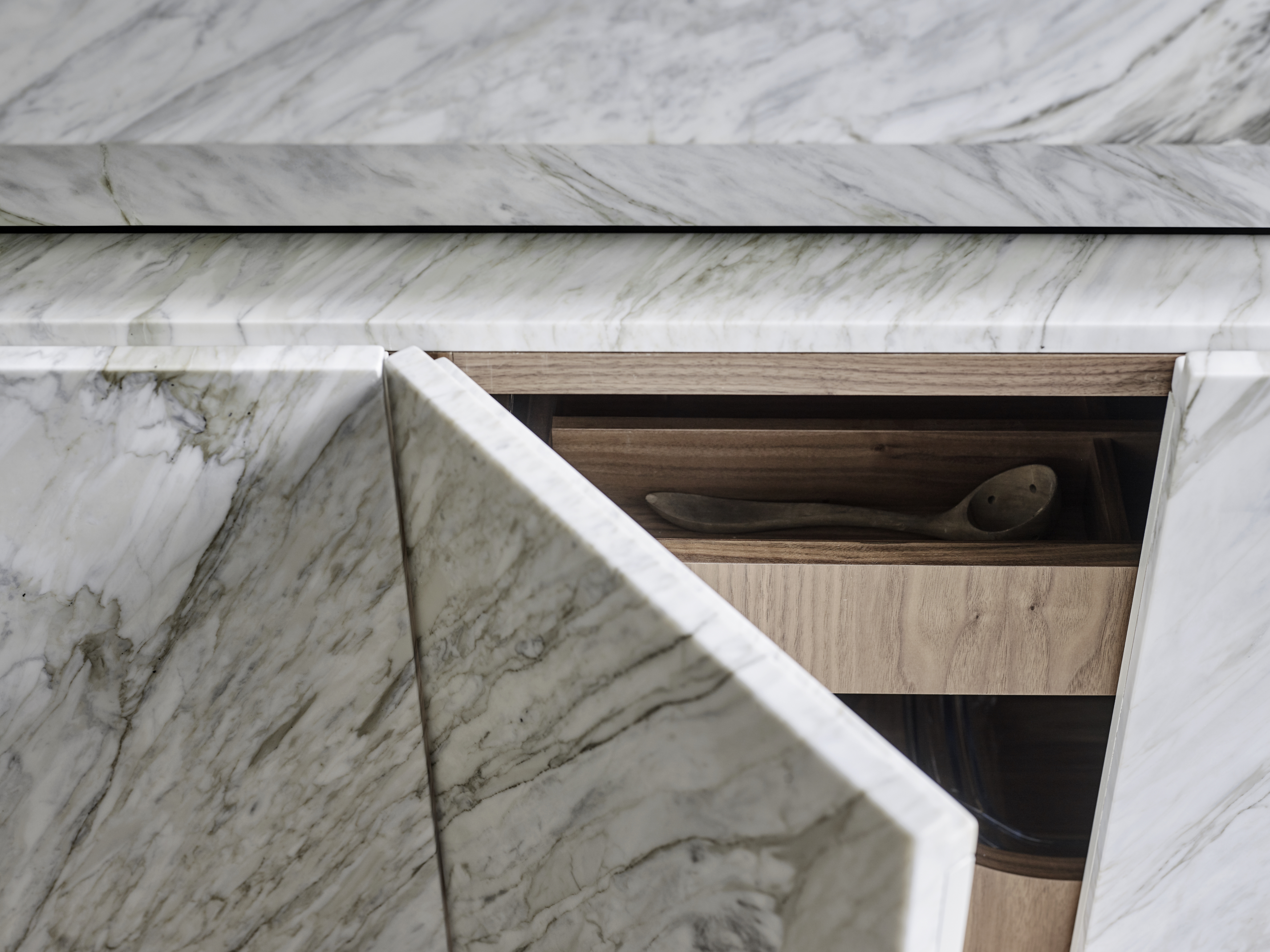 Kitchen cupboards by roundhouse with marble work surfaces