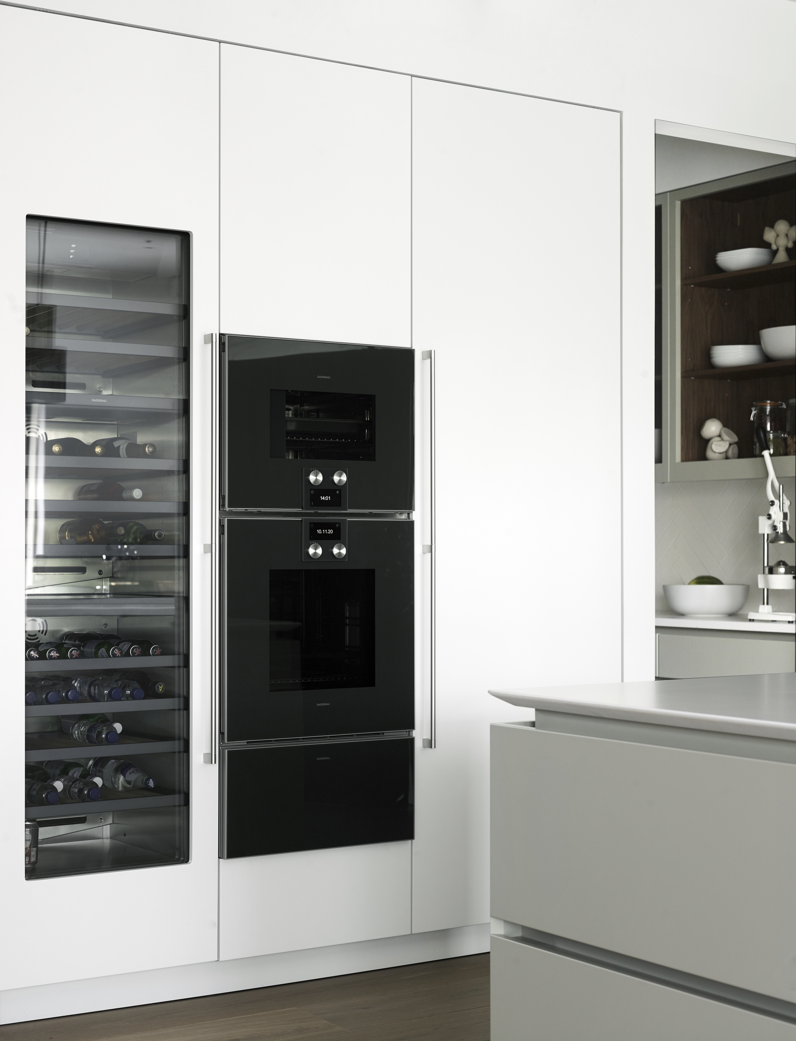 Luxury kitchens by Roundhouse with kitchen appliances and wine storage