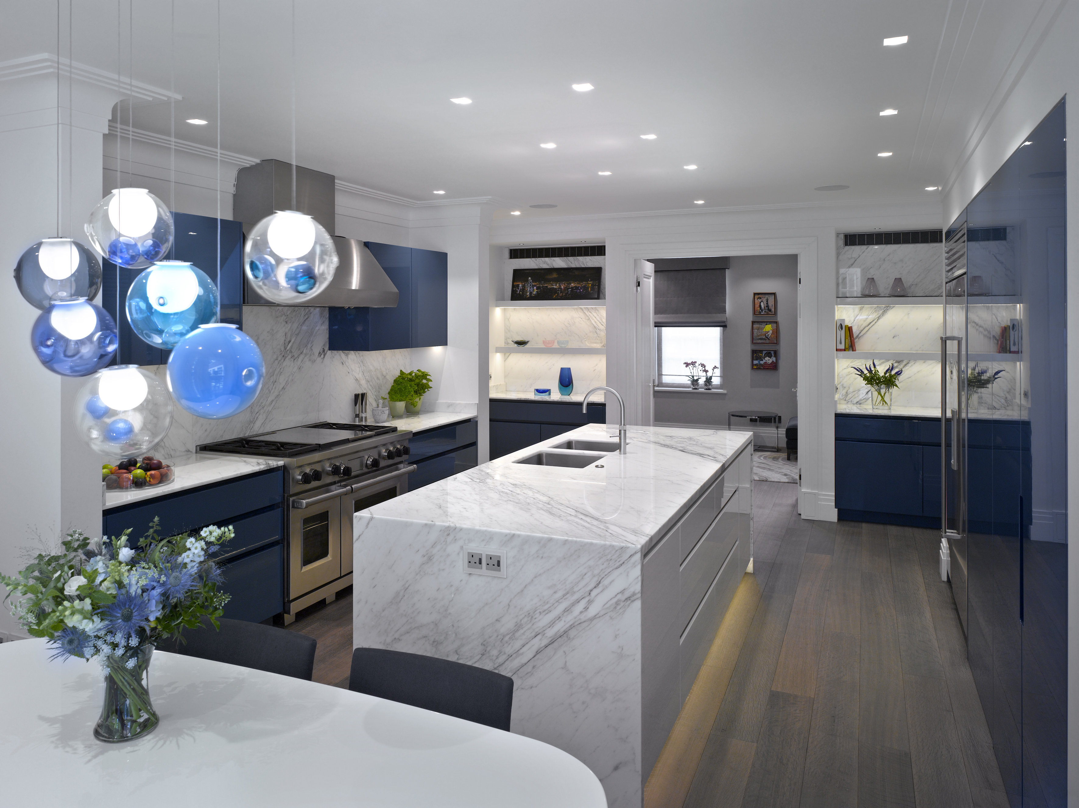 kitchen lighting ideas with bespoke kitchen island and marble work surface