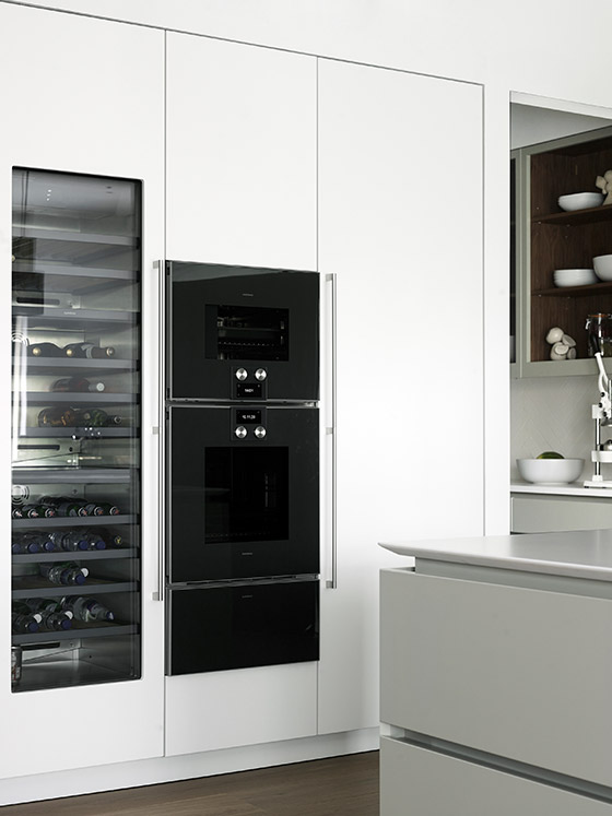 Luxury kitchen design with wine storage and bespoke cabinetry