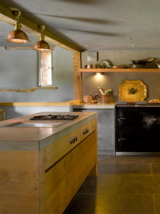 Beautiful luxury kitchen with wood island and concrete work surface