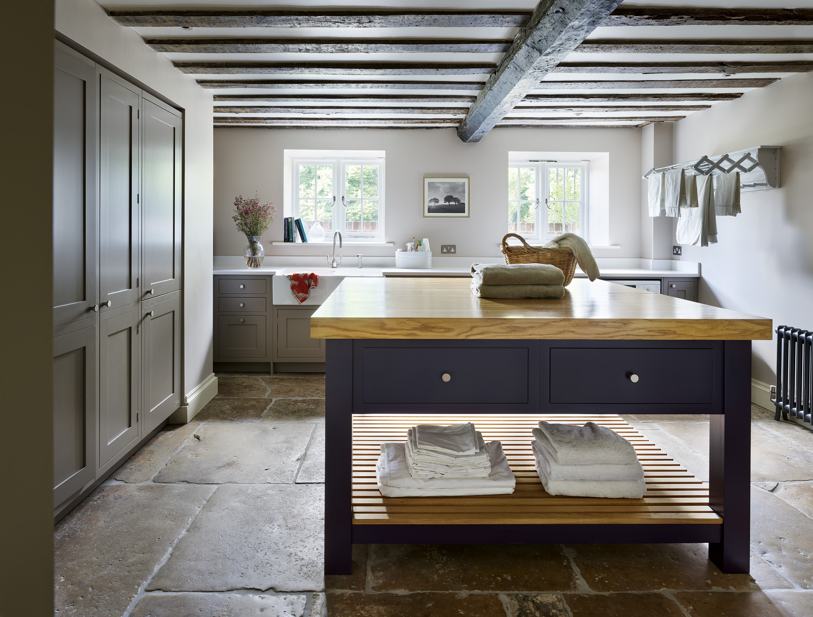 Luxury design utility room with bespoke island