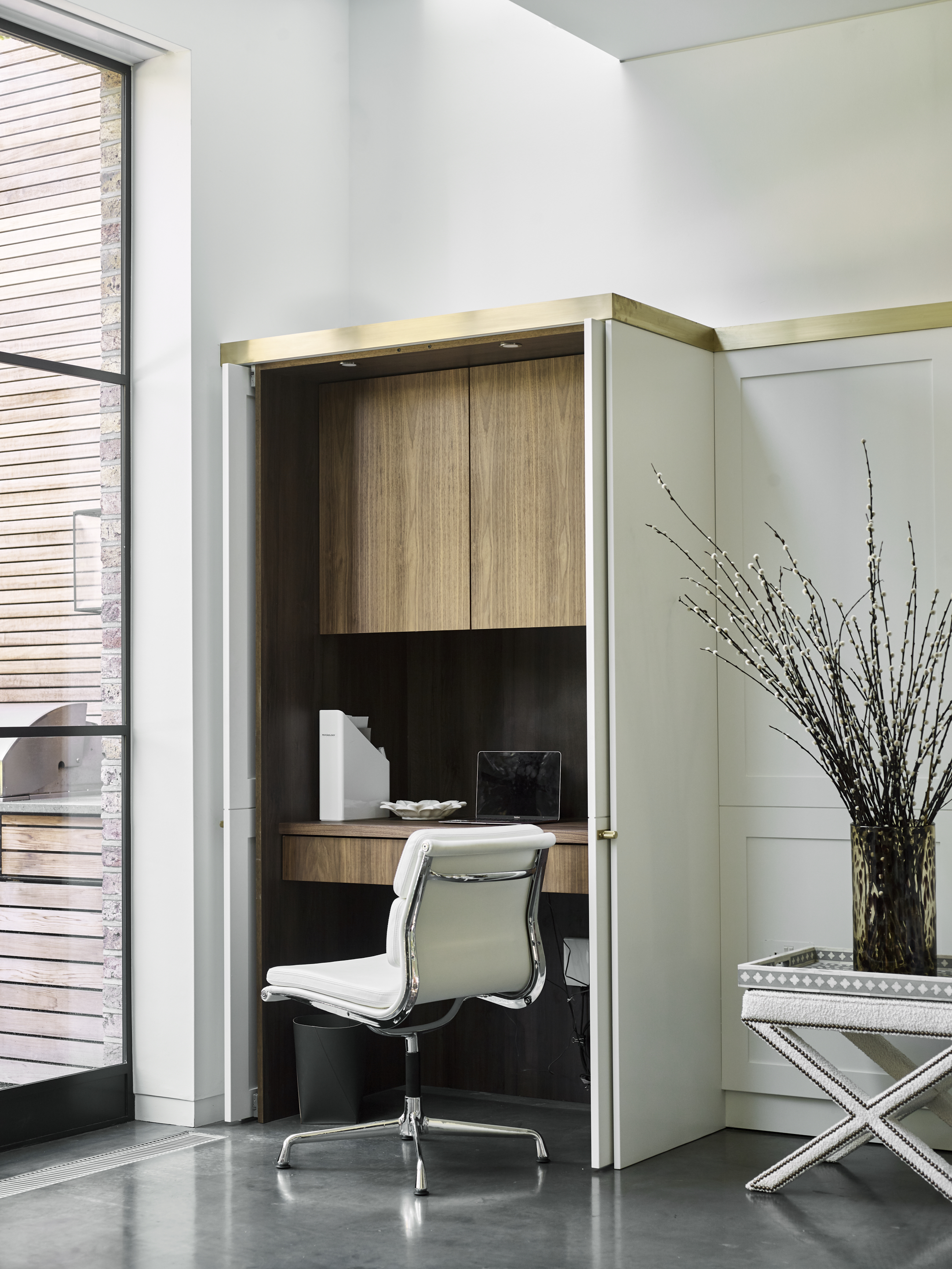 Bespoke home office in white with pocket doors