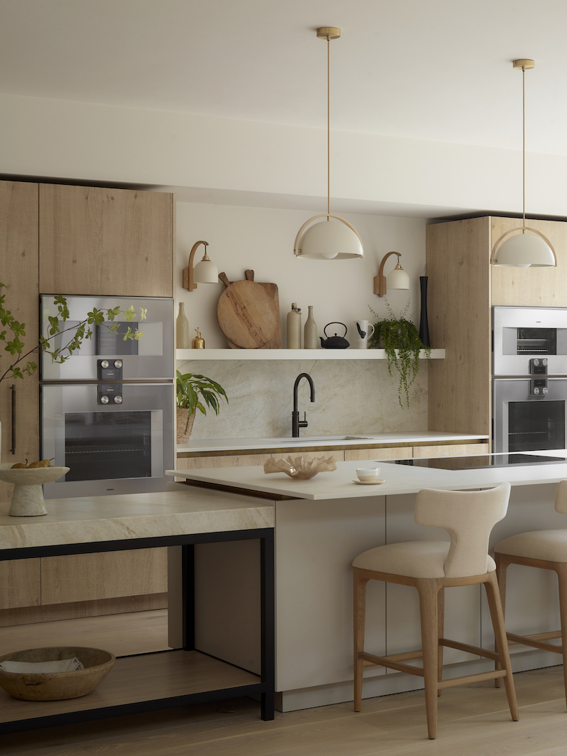 Bespoke kitchen design featuring rough sawn oak cabinetry, brass and powder-coated steel detail.