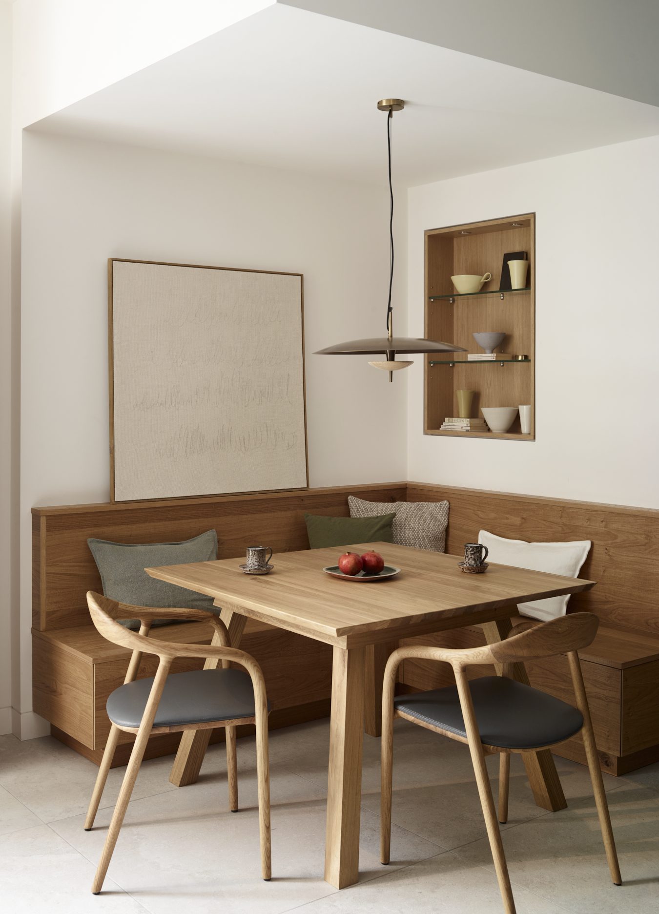 Timeless breakfast nook with bespoke banquette seating, natural timber finishes and comfortable kitchen seating designed for dining, working and relaxing.